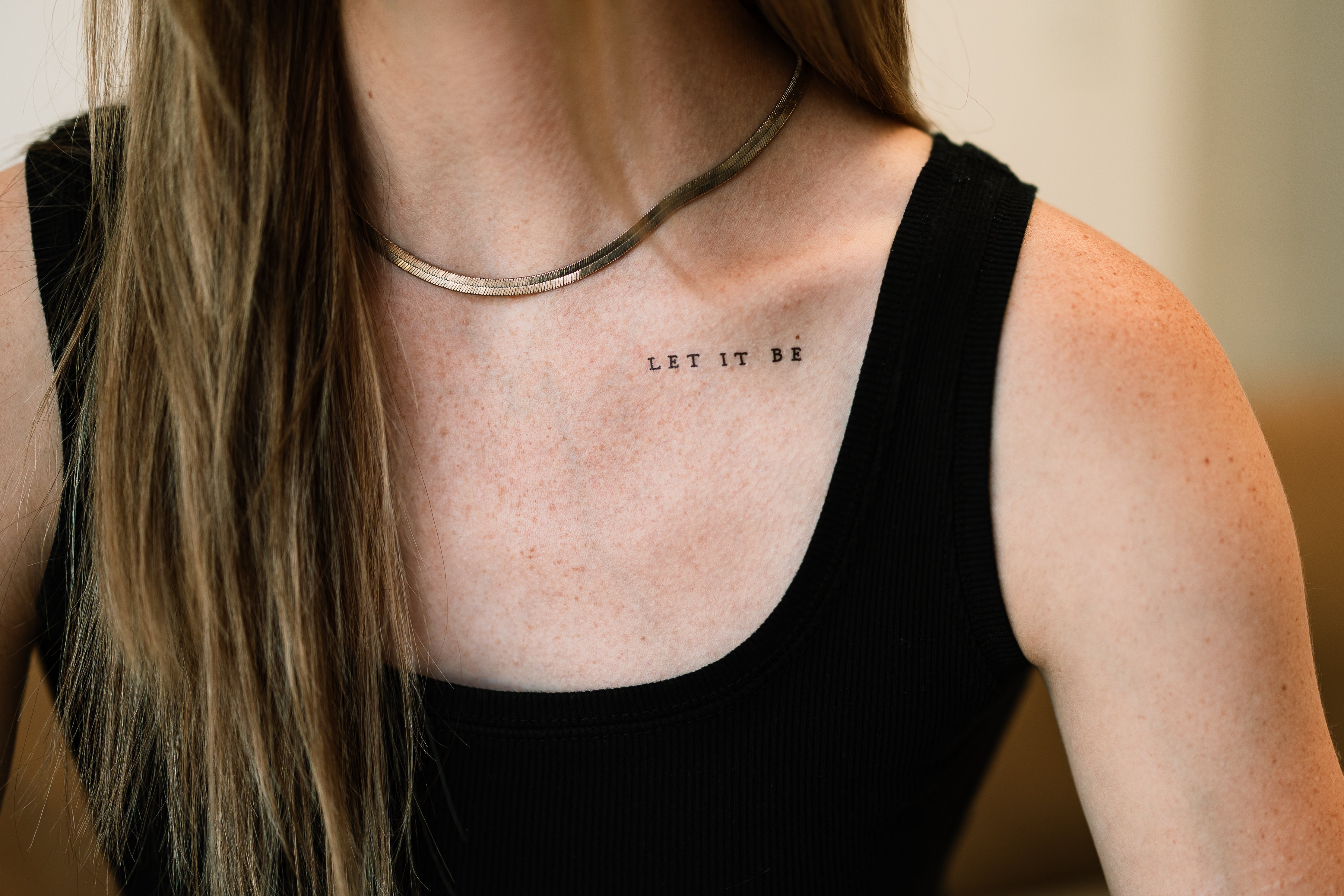 "Let it Be" text as a temporary tattoo