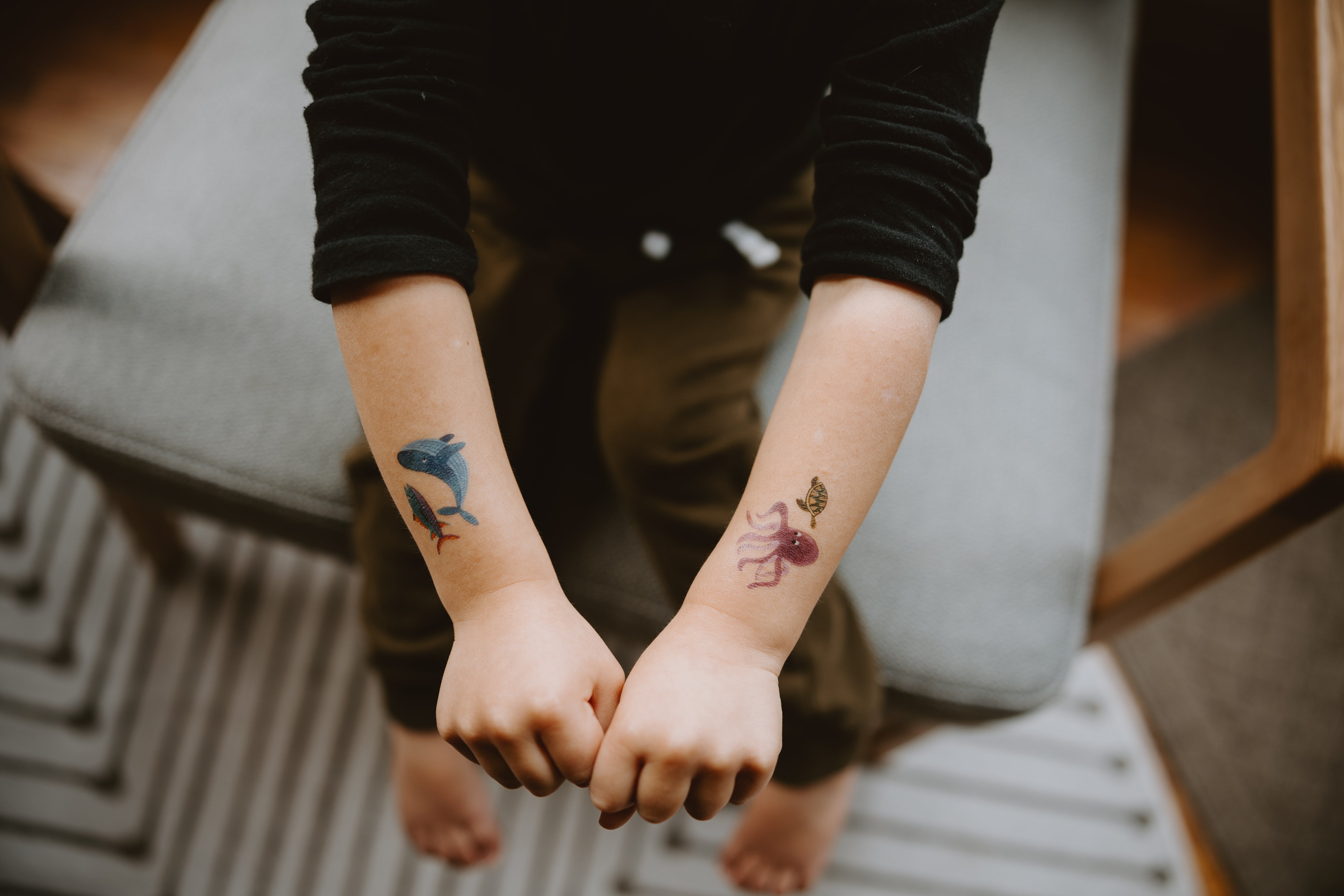 Children's temporary tattoos of a whale, an octopus, and a turtle