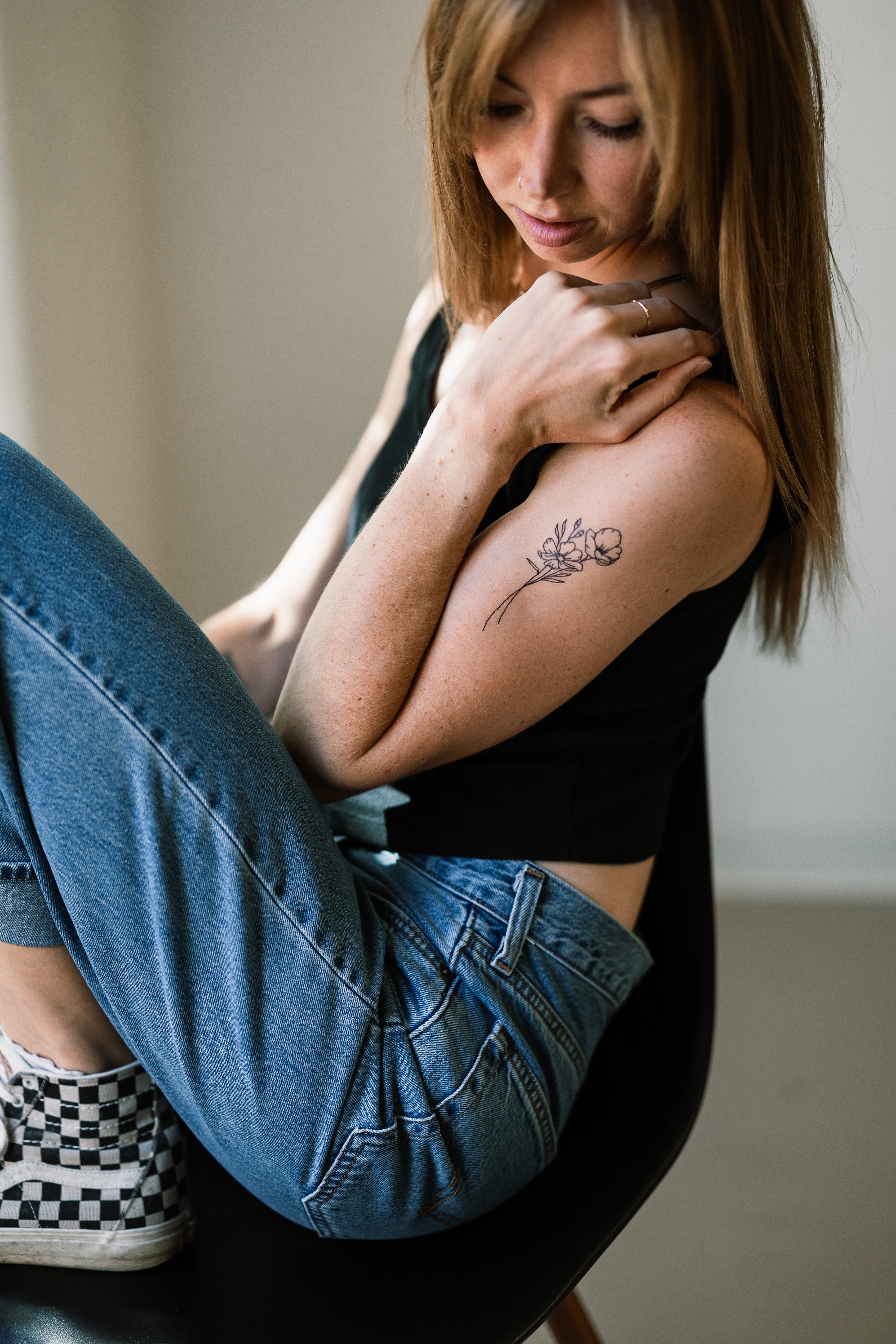 Poppy Field temporary tattoo on a woman's arm
